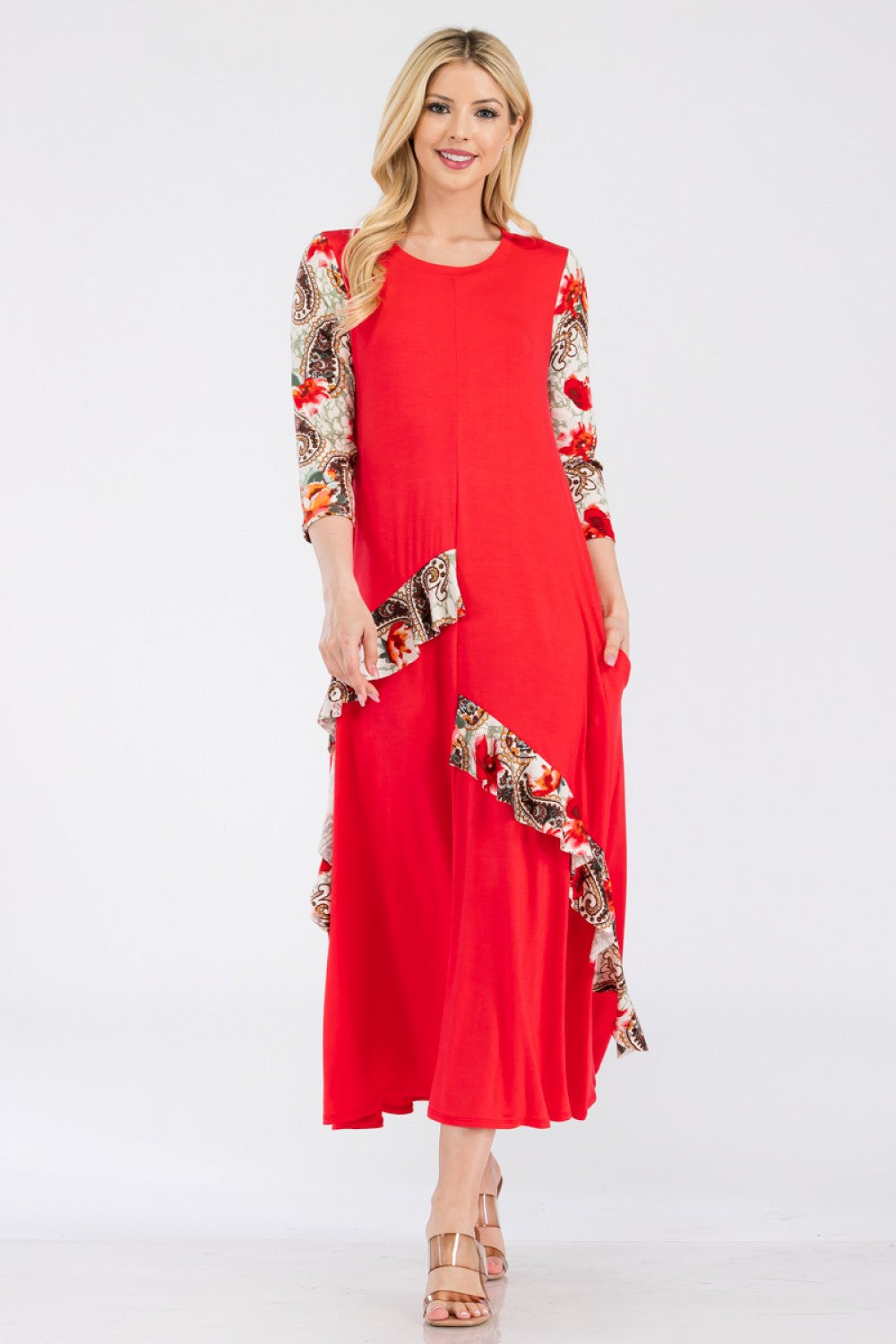 Coral dress with tan and coral paisley print sleeves and ruffles